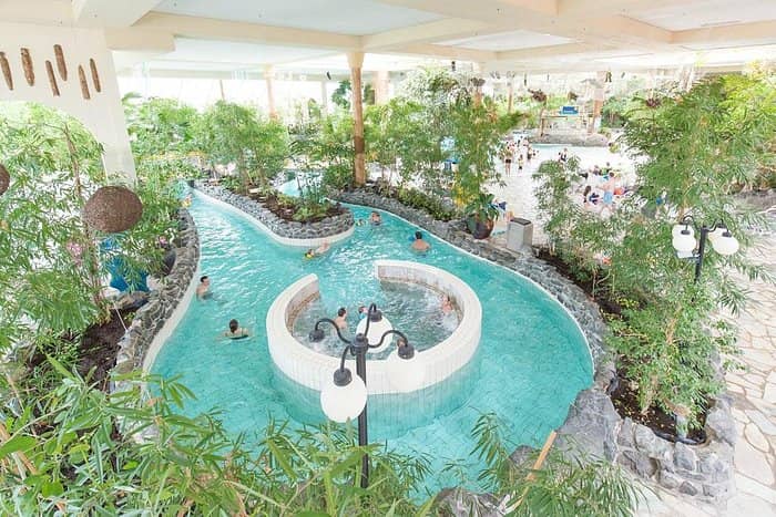 A swimming pool at a resort or nearby.